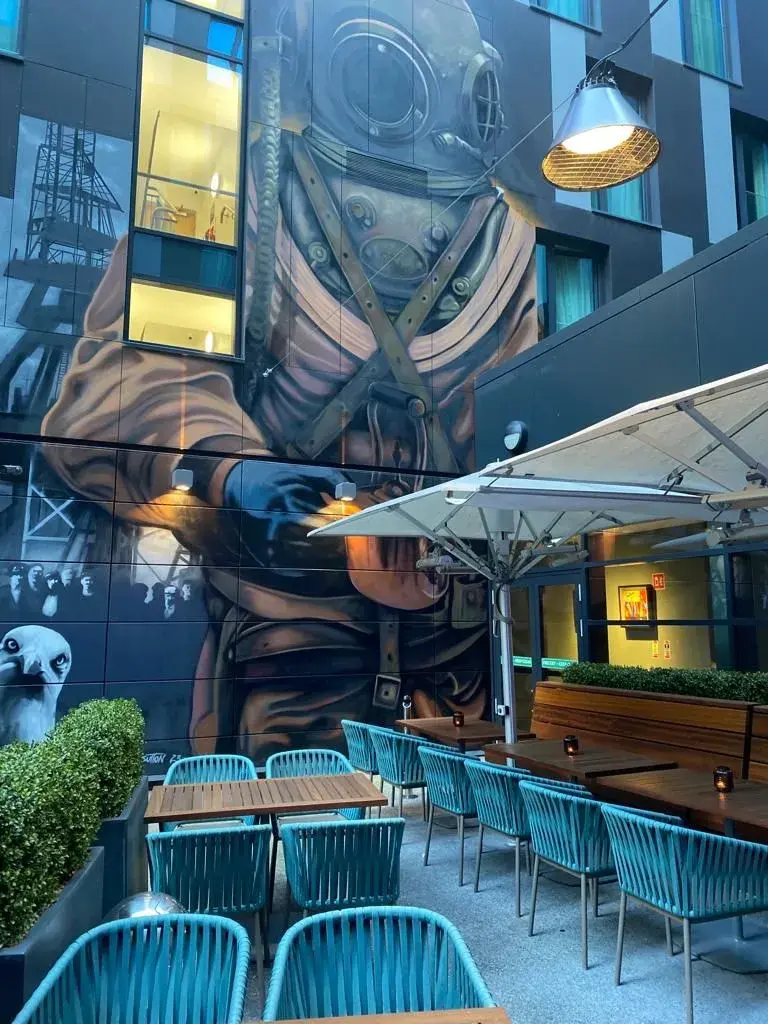 Mossco Outdoor Terrace, with the bespoke Shane Sutton diving bell mural