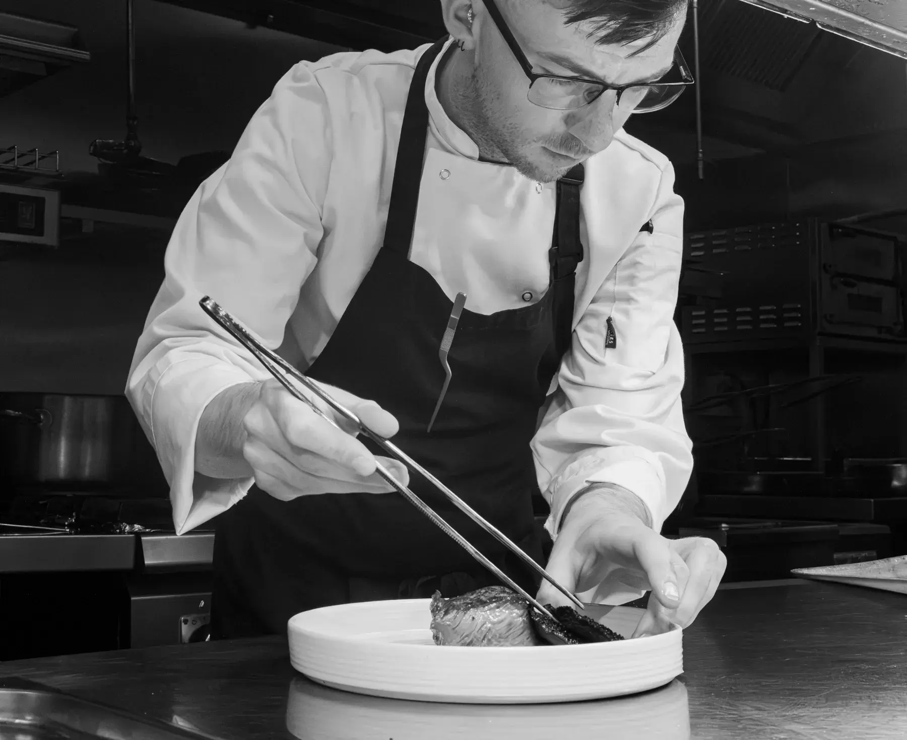 Chef preparing food at Mossco