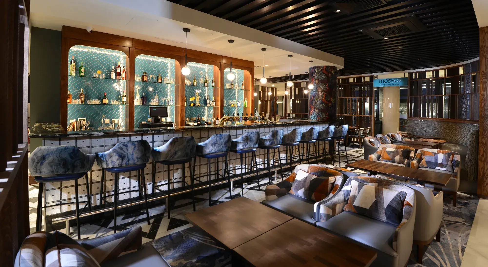 Mossco bar interior with dining tables